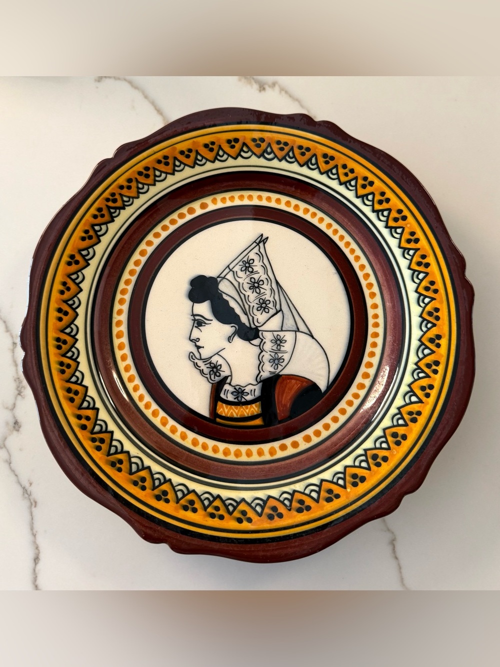 Two, 10inch Quimper Hand-painted Portrait Plates of Breton Woman and Breton Man.